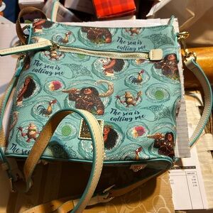 Dooney & Bourke Blue and Cream Crossbody Bag with Whimsical Design Moana Maui